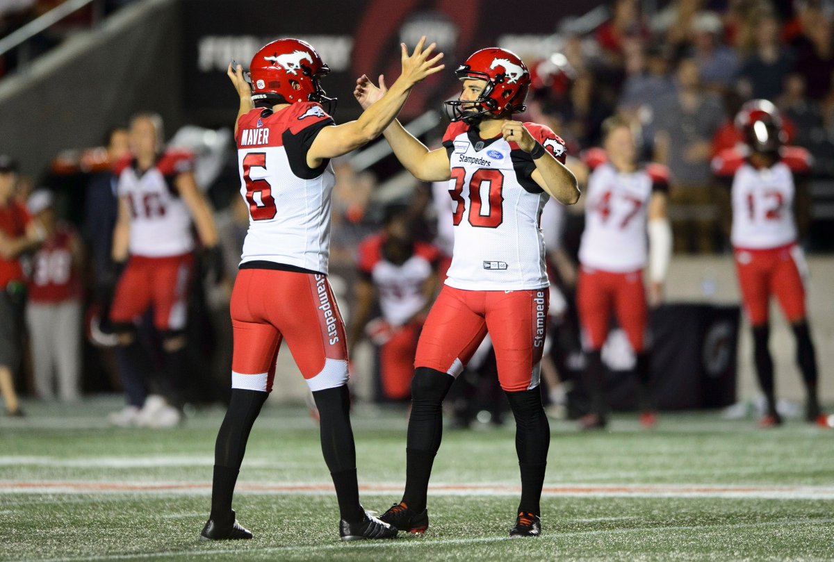Calgary Stampeders kicker Rene Paredes, right, celebrates his game winning kick with teammate Rob Maver as they took on the the Ottawa Redblacks during second half CFL action in Ottawa on Thursday, July 25, 2019. The Stamps took the Redblacks 17-16. 