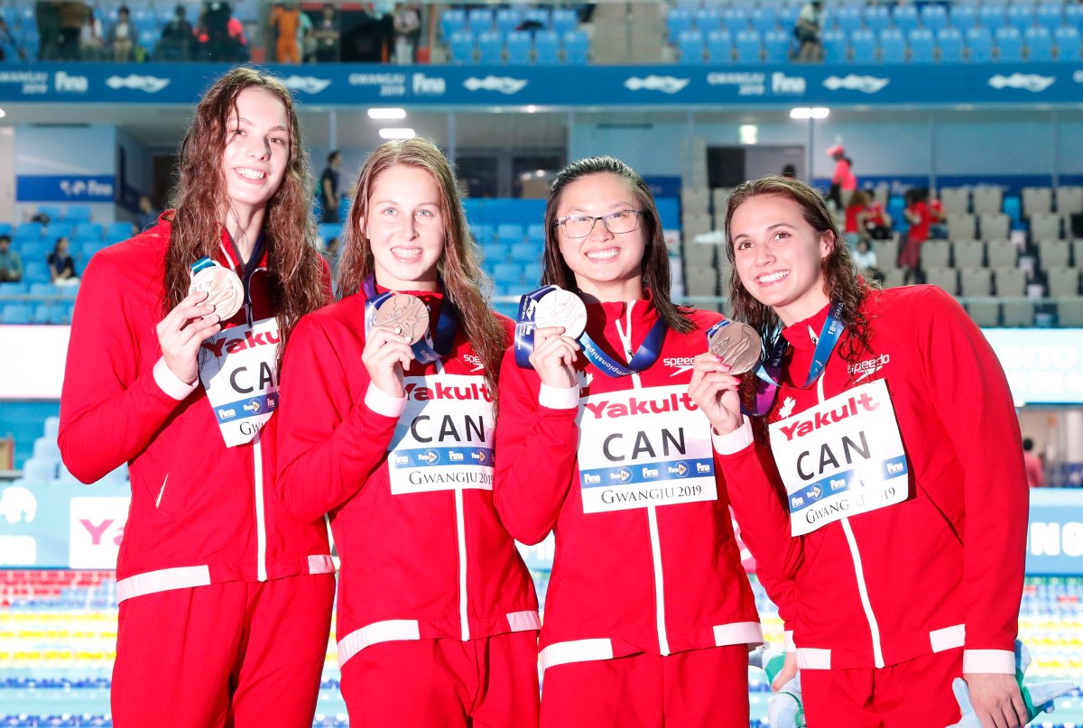 Bronze medal Team Canada pose for photographs during the award ceremony for the women's 4x100m Medley Relay final at the FINA Swimming World Championships 2019 in Gwangju, South Korea, 28 July 2019.  EPA/JEON HEON-KYUN.
