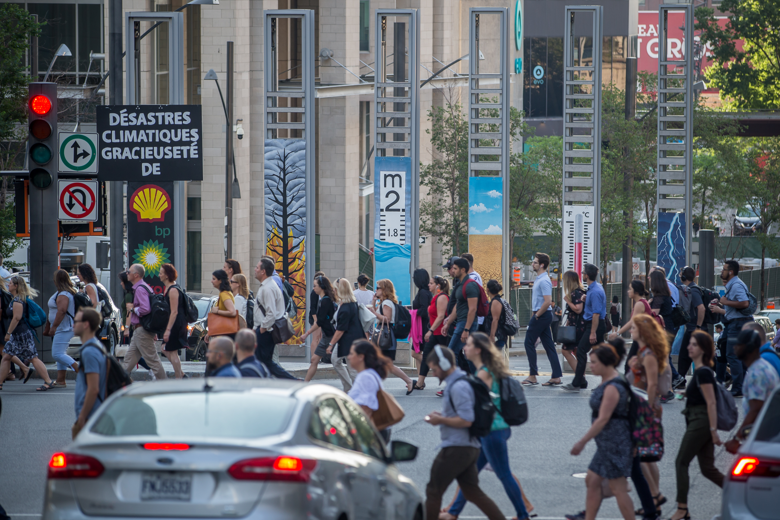 Greenpeace puts up banners downtown Montreal to protest against oil  companies - Montreal | Globalnews.ca