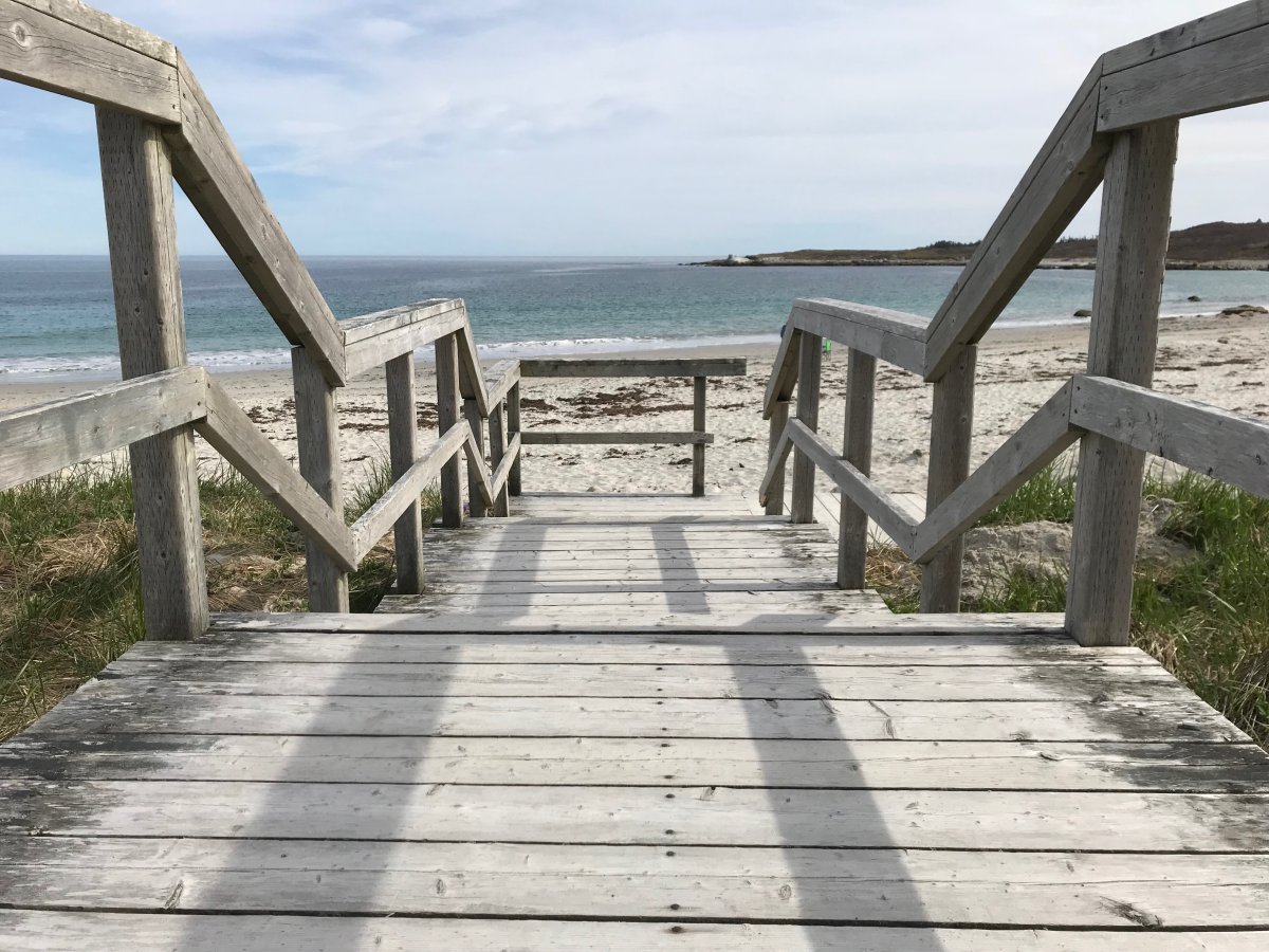 Steps leading down to Crystal Crescent Beach in May 2018. 
