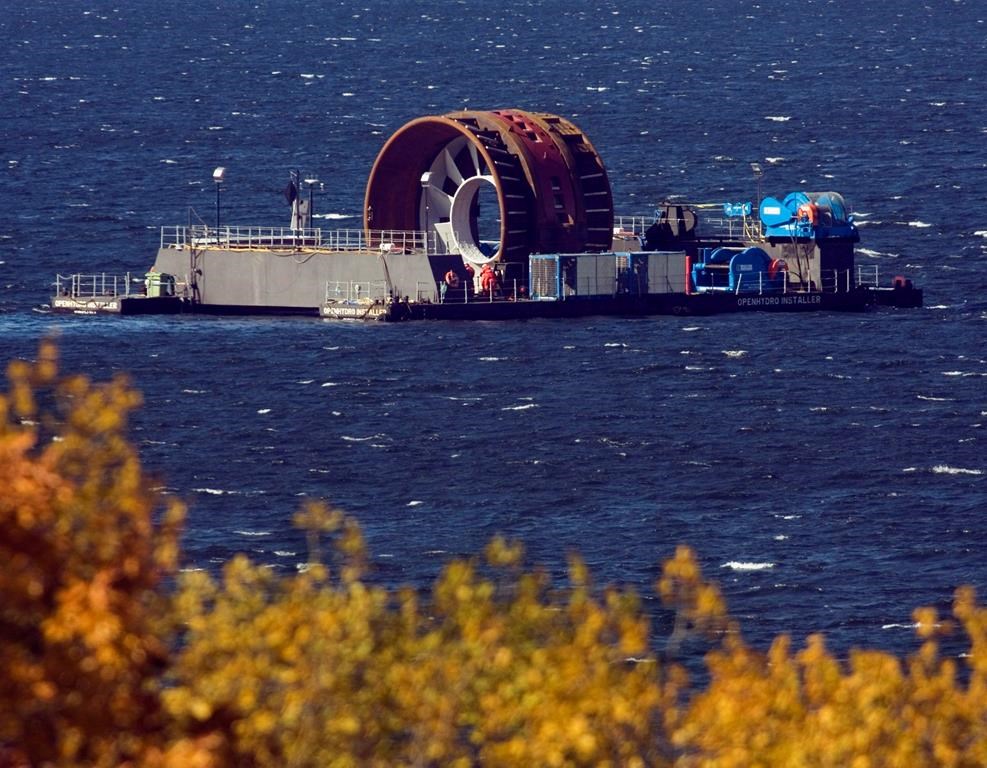 A tidal power turbine, built for Nova Scotia Power, is towed in the Bedford Basin in Halifax on Oct. 26, 2009.