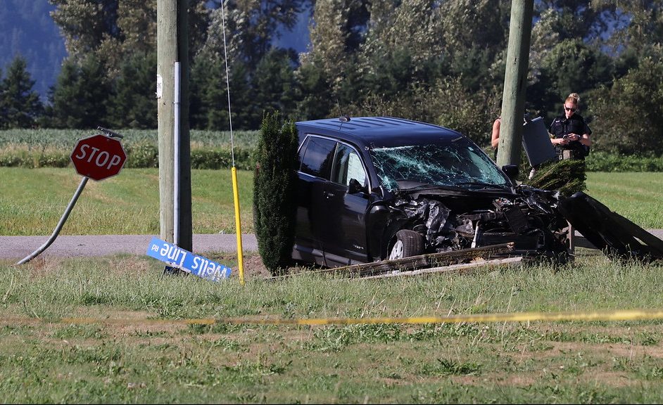 Abbotsford police on scene of a fatal crash between a SUV and a pickup truck on Friday, July 26, 2019.