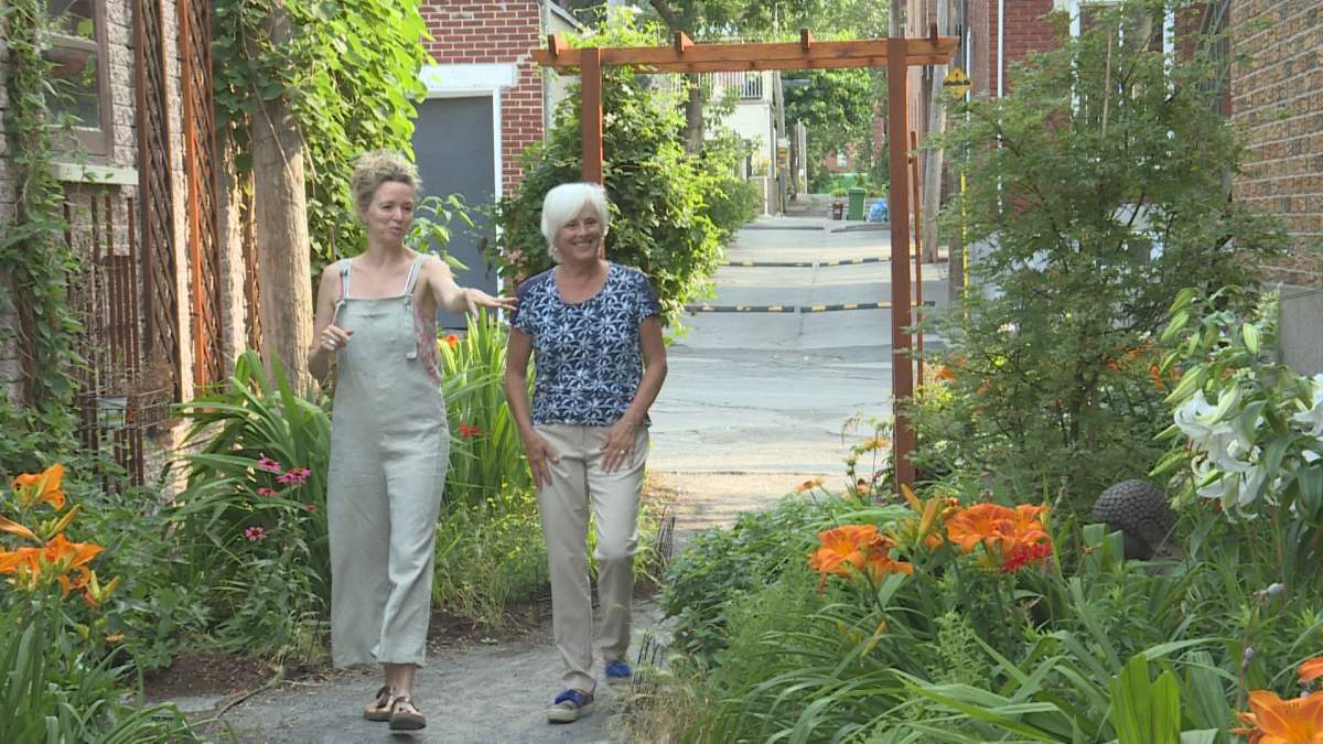 Annik Hamel walks through her garden in Montreal.