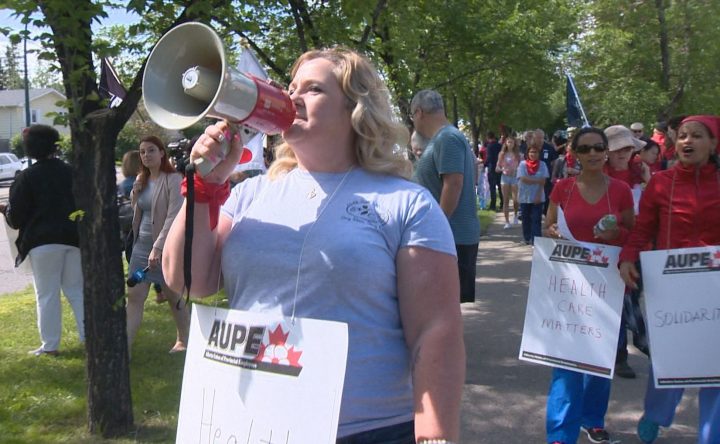 AUPE union workers and allies rallied at Foothills Medical Centre on Wednesday in protest of Bill 9.