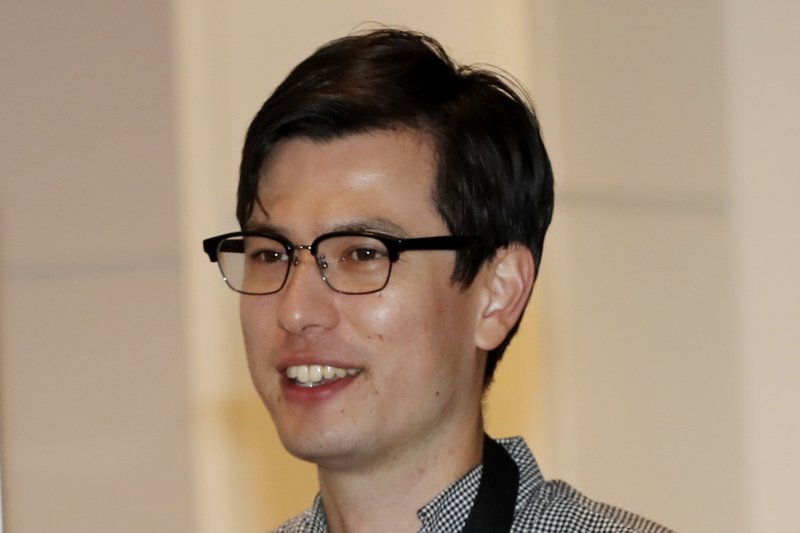 Australian student Alek Sigley arrives at the airport in Tokyo on Thursday, July 4, 2019. The Australian student who vanished in North Korea more than a week ago arrived in Tokyo Thursday, July 4, 2019.