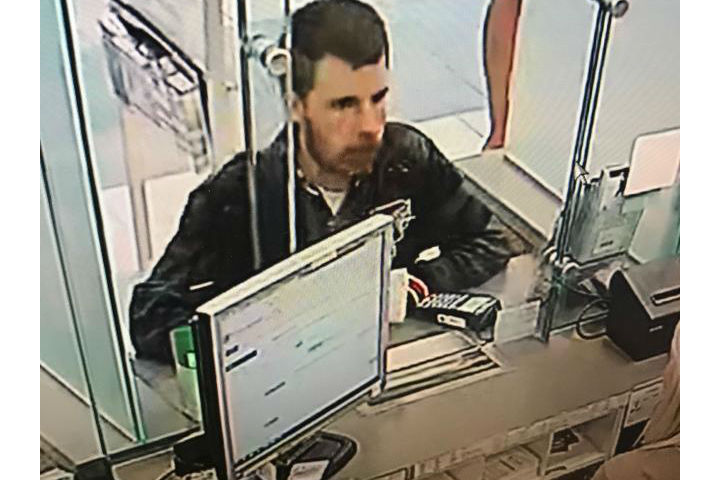 The suspect is described to be 25 years old, with acne scars on his face, brown hair and a beard.
