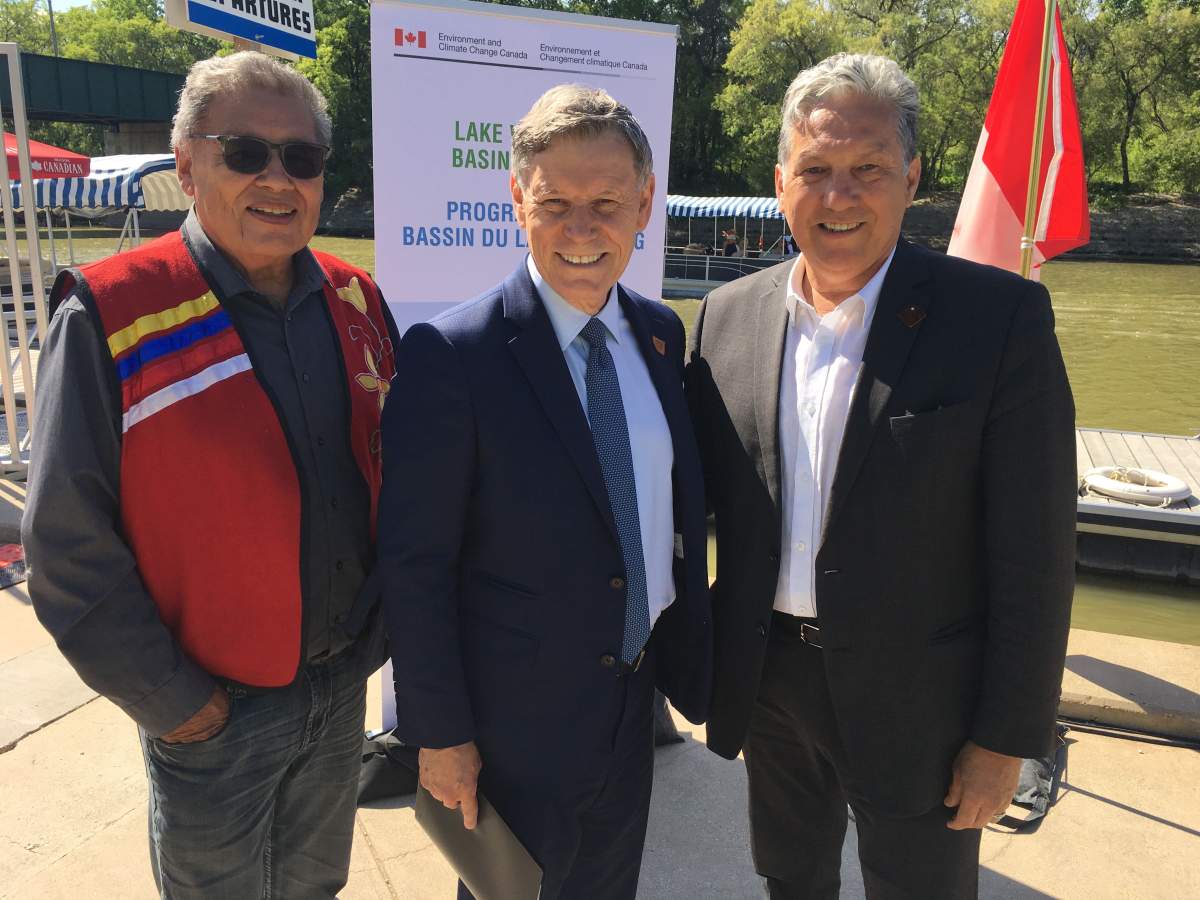 Jim Bear, MP Terry Duguid and MP Dan Vandal at the announcement.