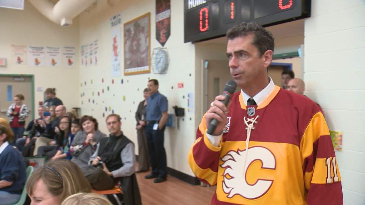 Beesley emceeing the annual wheelchair hockey game at Gordon Townsend School.