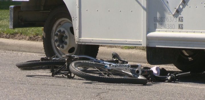A man was killed after being struck by a vehicle while he was cycling in northeast Calgary on Friday, according to police.​.