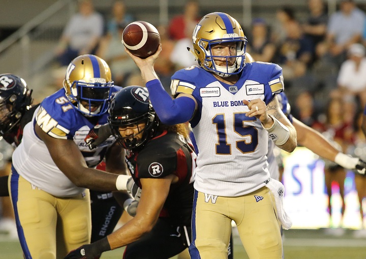 Winnipeg Blue Bombers quarterback Matt Nichols (15) throws the ball during second quarter CFL action against the Ottawa Redblacks in Ottawa on Friday, July 5, 2019.  