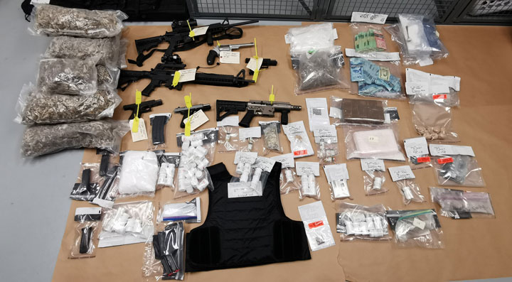 Saskatoon police seized guns and various drugs at a home in the Stonebridge neighbourhood this past weekend.