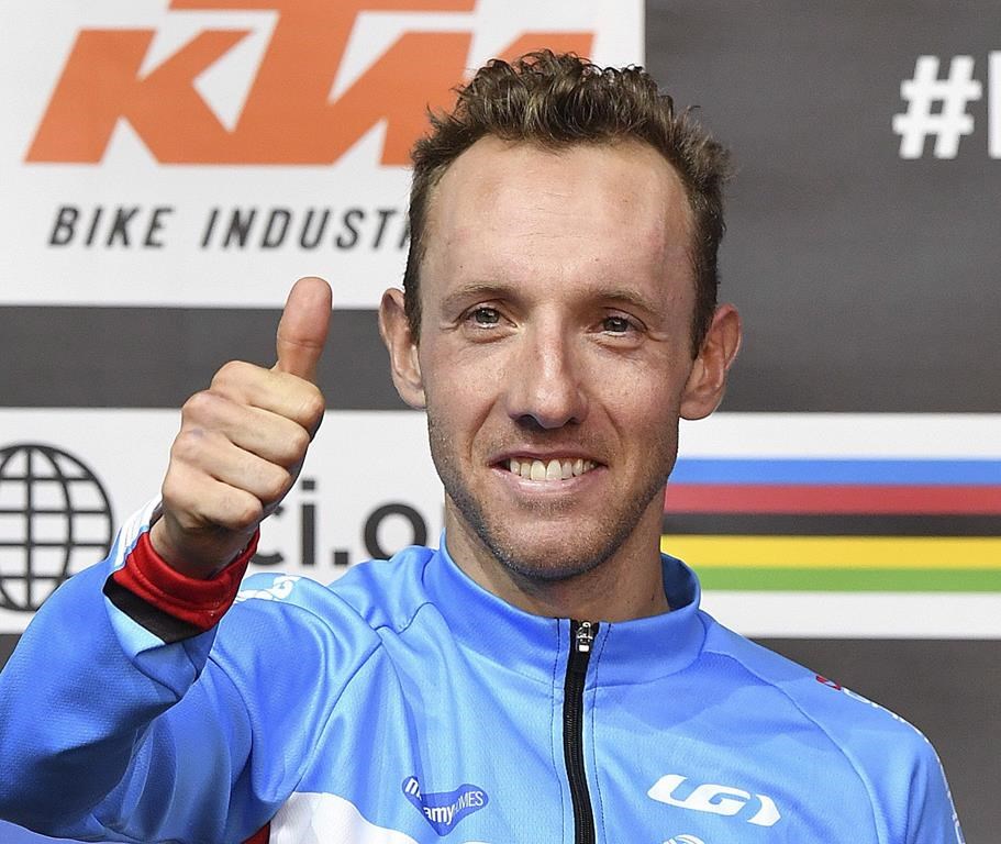 Third-place winner Michael Woods from Canada gives a thumbs up after the men's road race at the Road Cycling World Championships in Innsbruck, Austria on Sept.30, 2018. Woods, in his first Tour, is aiming for a stage win. The 106th edition of the Tour opens Saturday in Brussels.