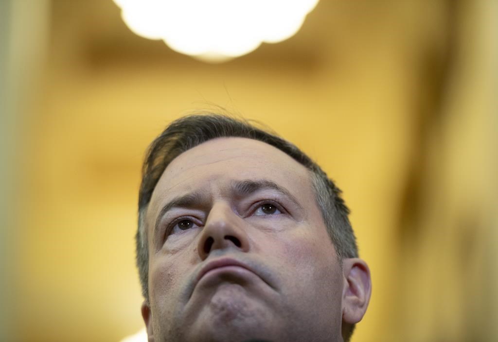 Alberta Premier Jason Kenney listens to questions from reporters after appearing at the Standing Senate Committee on Energy, the Environment and Natural Resources about Bill C-69 at the Senate of Canada Building on Parliament Hill in Ottawa on May 2, 2019. The CEOs of nine Alberta natural gas producers have released an open letter to Premier Jason Kenney asking him to show "bold leadership" in supporting a plan to restrict production to boost low gas prices.