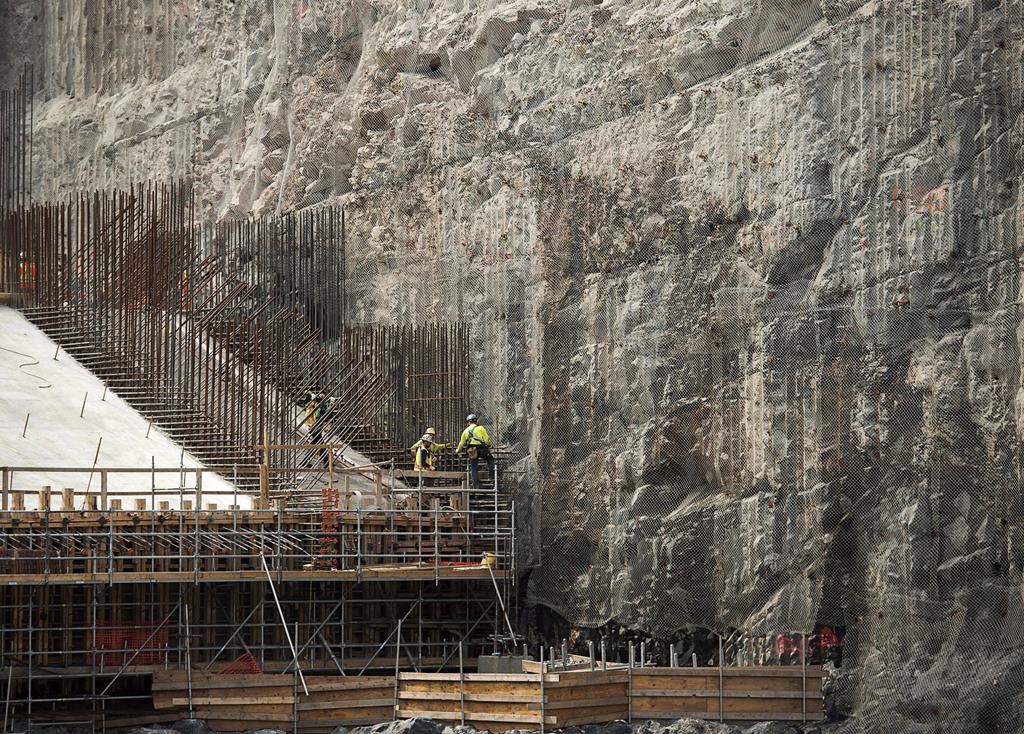 The construction site of the hydroelectric facility at Muskrat Falls, Newfoundland and Labrador is seen on Tuesday, July 14, 2015. The $12.7-billion Muskrat Falls hydroelectric dam in Labrador is finally nearing completion, billions of dollars over budget and years behind schedule.