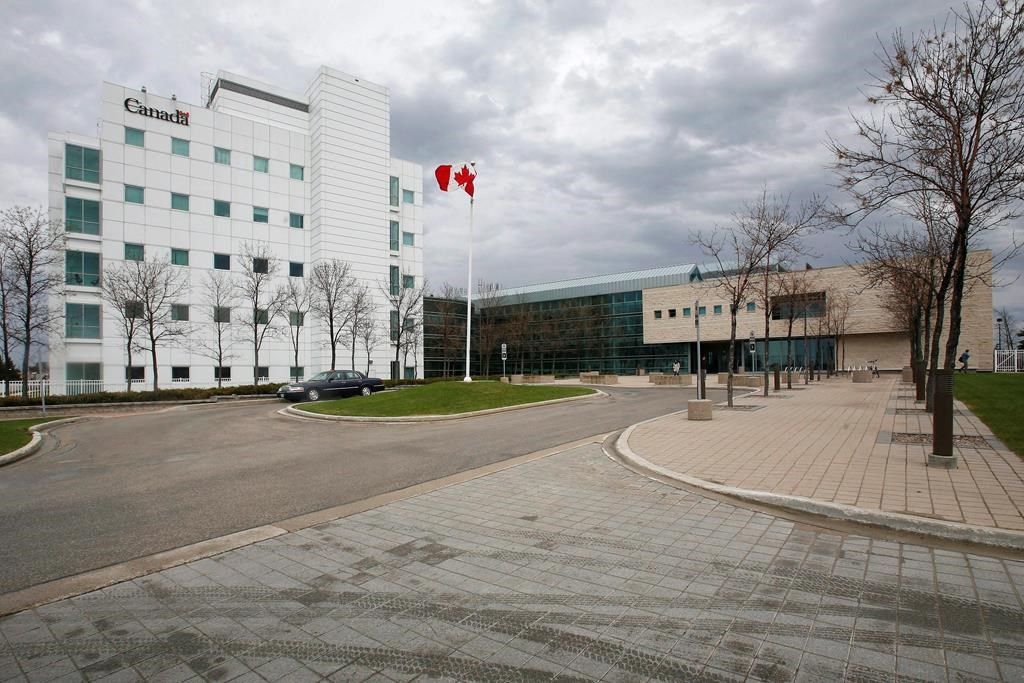The National Microbiology Laboratory is shown in Winnipeg on May 19, 2009. The University of Manitoba has cut ties with a researcher who helped develop the Ebola vaccine while she is being investigated by the RCMP.A spokesperson says Dr. Xiangguo Qiu and her husband, Keding Cheng, have both had their non-salaried adjunct appointment at the university severed pending the investigation.THE CANADIAN PRESS/John Woods.