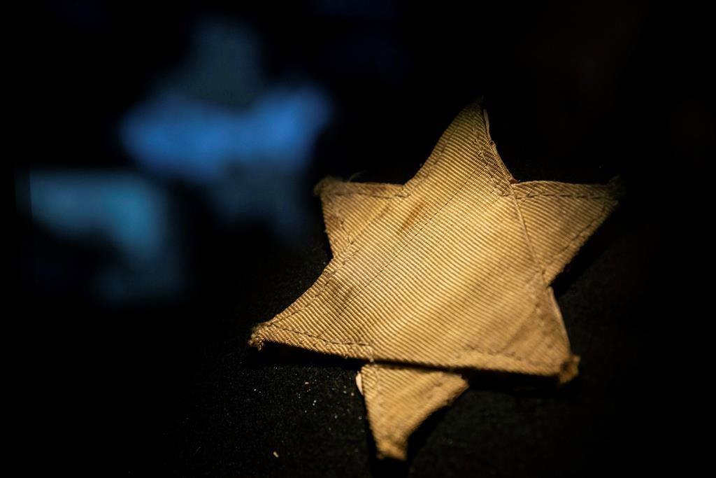 A yellow star to represent the Star of David, made of fabric on display in the Holocaust Memorial Center in Budapest, Hungary, Thursday, Jan. 24, 2019. CANADIAN PRESS/AP, Balazs Mohai/MTI.