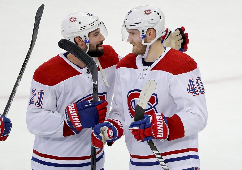 Montreal Canadiens right wing Joel Armia (40) celebrates with center Nate Thompson (21) after the Canadiens beat the New York Rangers 4-2 in an NHL hockey game, Friday, March 1, 2019, in New York.
