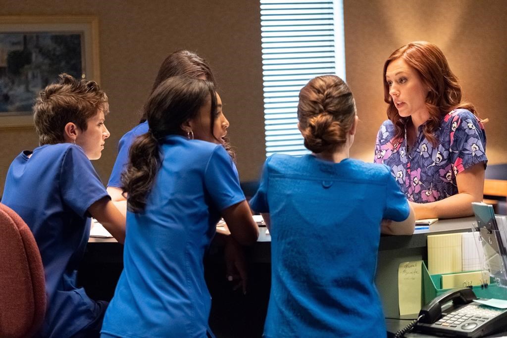 Actor Ashley Bratcher (right) is shown in a scene from the film “Unplanned.”.