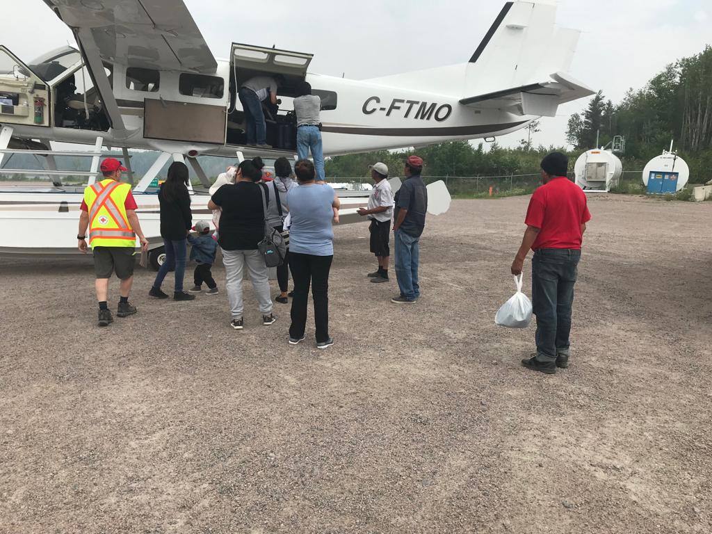 Red Cross workers in Manitoba are evacuating "Priority 1" residents from Little Grand Rapids and Pauingassi First Nations due to smoke from wildfires in the area.