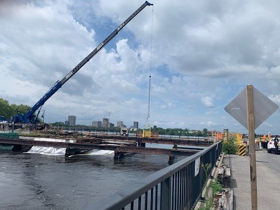 Ottawa paramedics say a man is in serious but stable condition after being struck by a metal beam and falling to into the Ottawa River.