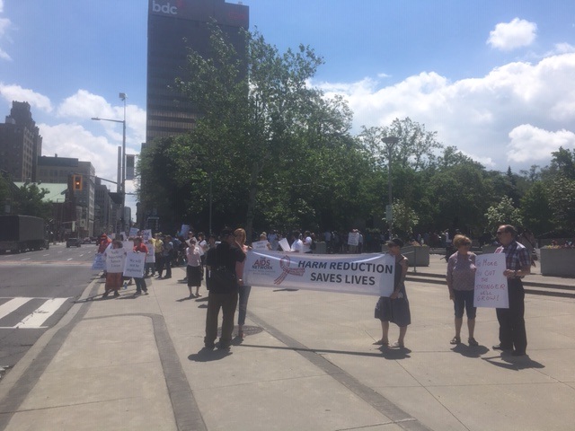 A few hundred people rallied outside of Hamilton City Hall on June 25 in support of the Wesley Day Centre.
