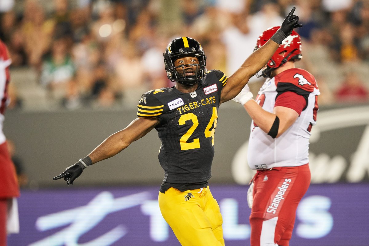 Hamilton's Delvin Breaux Sr. celebrates a turnover during fourth quarter CFL action between the Tiger-Cats and Calgary Stampeders in Hamilton, on Saturday, July 13, 2019.