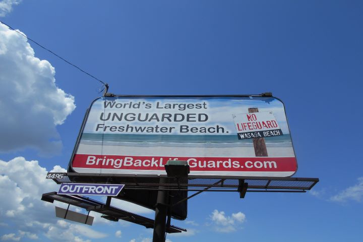 Watt erected a billboard this year to support his efforts in bringing back lifeguards to Wasaga Beach.