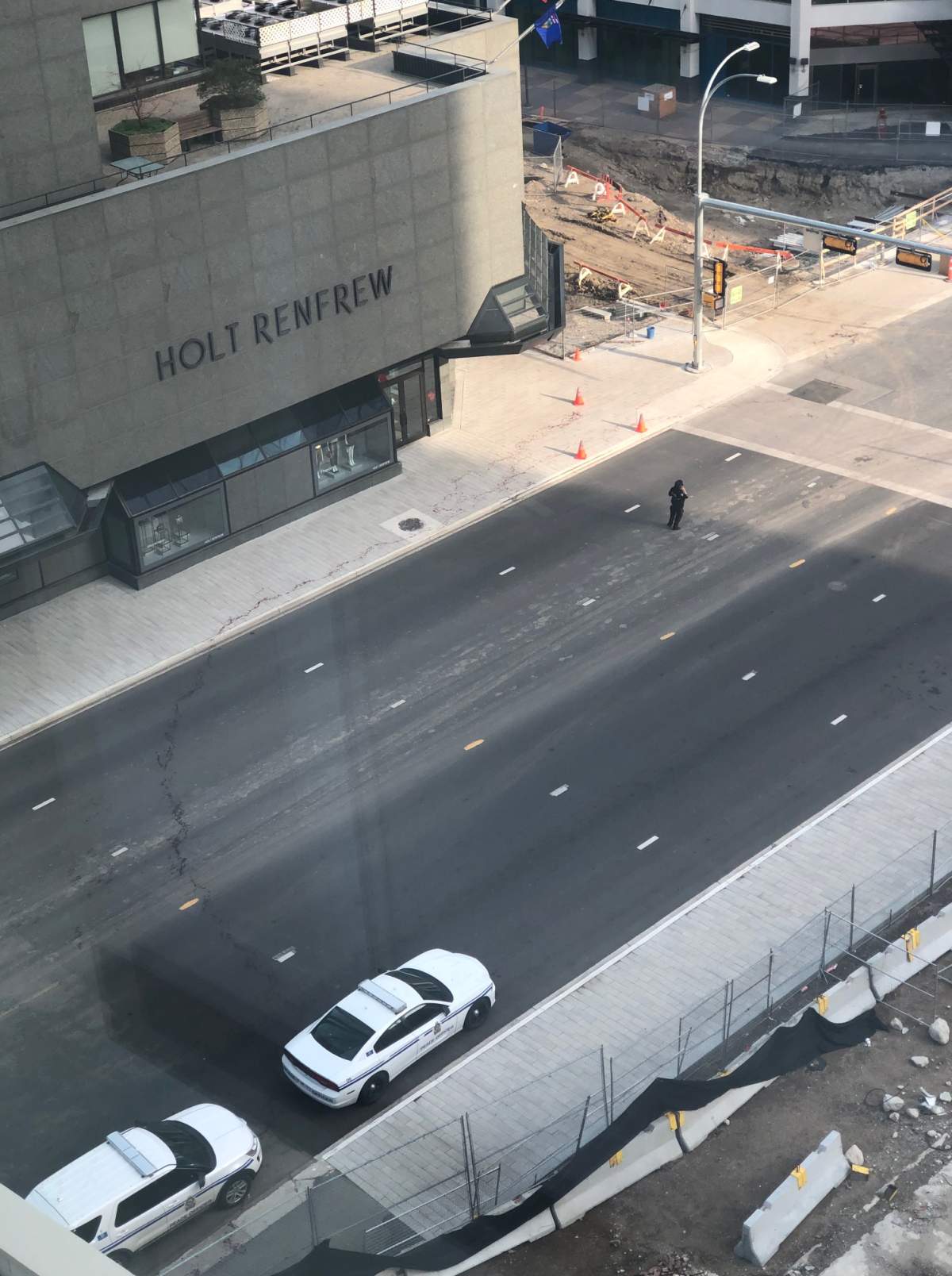 Edmonton police investigate an assault in the area of 101 Street and 102 Avenue Friday, July 5, 2019.