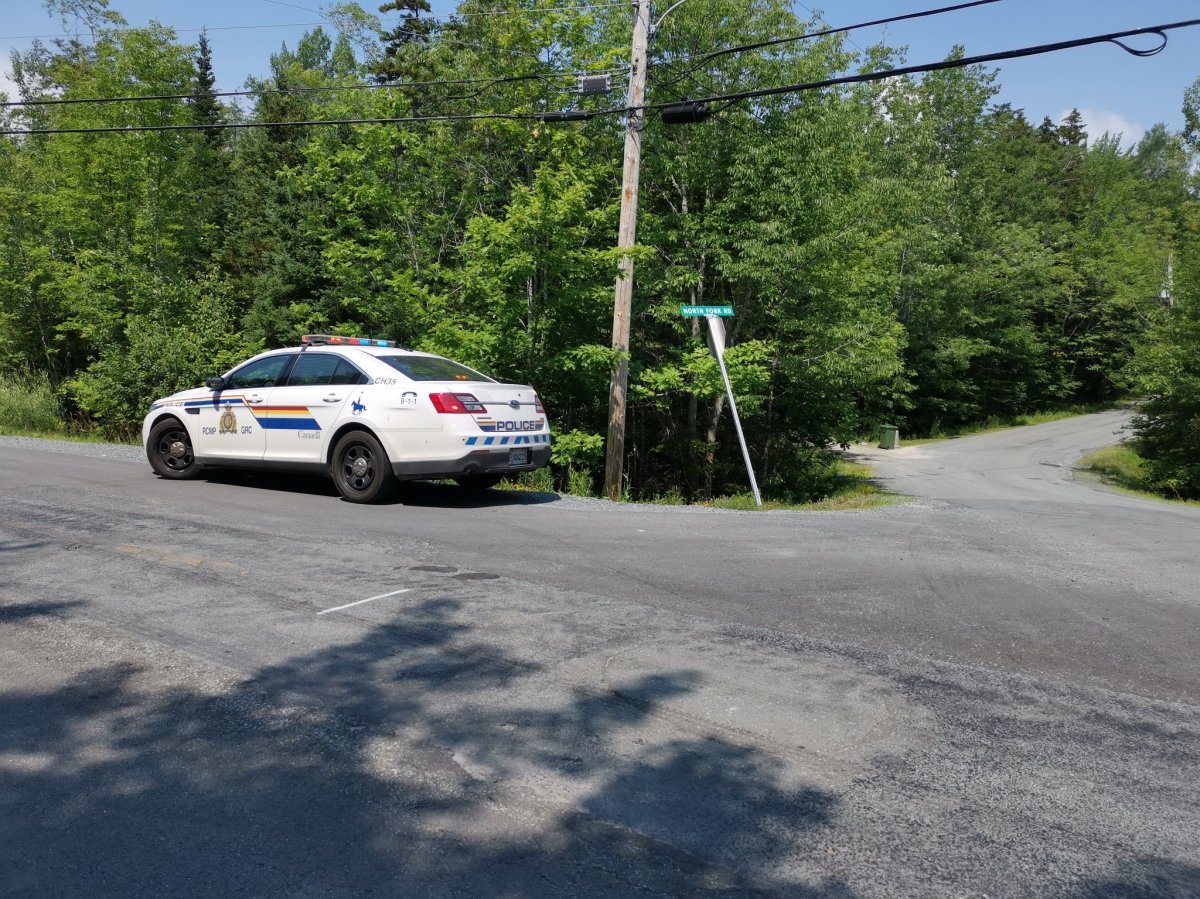 Police on the scene of a reported crash between a train and a vehicle near North Fork Road on July 29, 2019. 