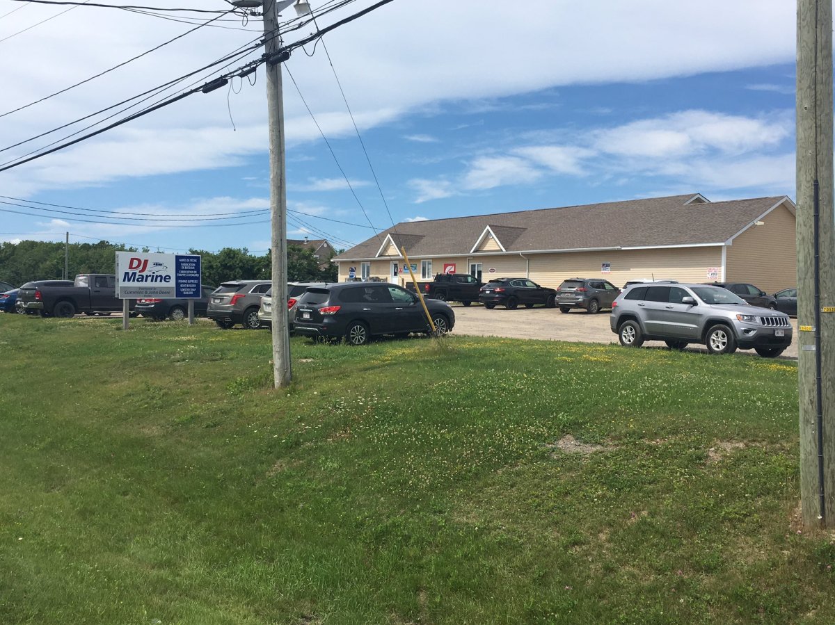 RCMP respond to a business in in Pointe-Sapin, N.B., where two bodies were found after a shooting on July 25, 2019.