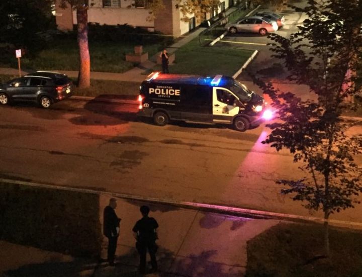 A photo of a police scene south of Jasper Avenue at 114 Street in Edmonton on Friday night.