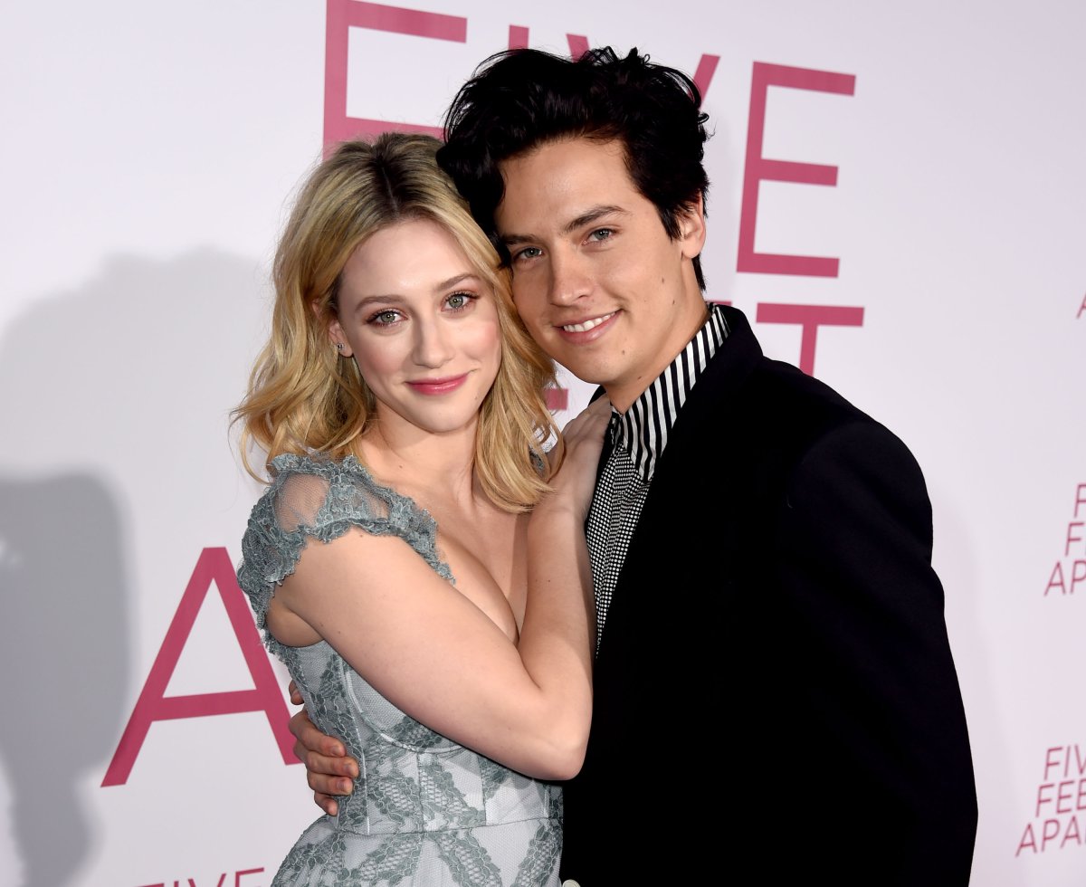 Lili Reinhart (L) and Cole Sprouse arrive at the premiere of CBS Films' 'Five Feet Apart' at the Fox Bruin Theatre on March 07, 2019 in Los Angeles, California.