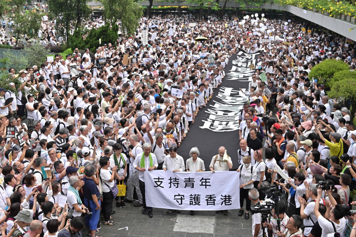 A group of elderly people march to the government headquarters in Hong Kong on July 17, 2019, in the latest protest against a controversial extradition bill. 