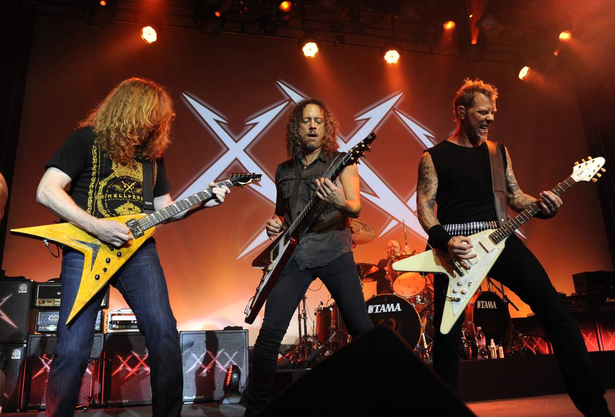 (L-R) Dave Mustaine, Kirk Hammett, and James Hetfield of Metallica perform at day four of the bands’ 30th Anniversary shows at The Fillmore on Dec. 10, 2011 in San Francisco, Calif.