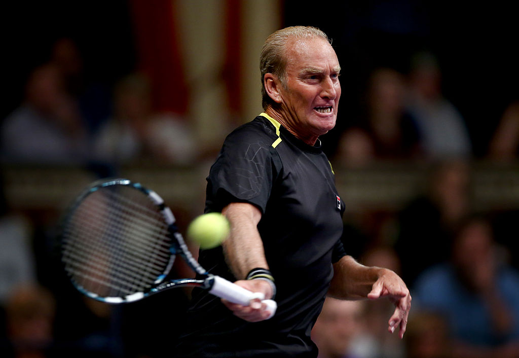 Peter McNamara of Australia plays a forehand during the Mens Doubles match between Mansour Bahrami and Andrew Castle against Pat Cash and Peter McNamara on day one of the Statoil Masters Tennis at the Royal Albert Hall on December 3, 2014 in London, England.  