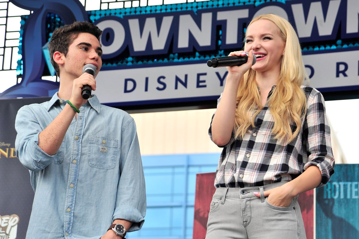 Cameron Boyce and Dove Cameron of Disney's 'Descendants' perform and join fans at Downtown Disney at Disneyland Resort on October 17, 2015 in Anaheim, California.  