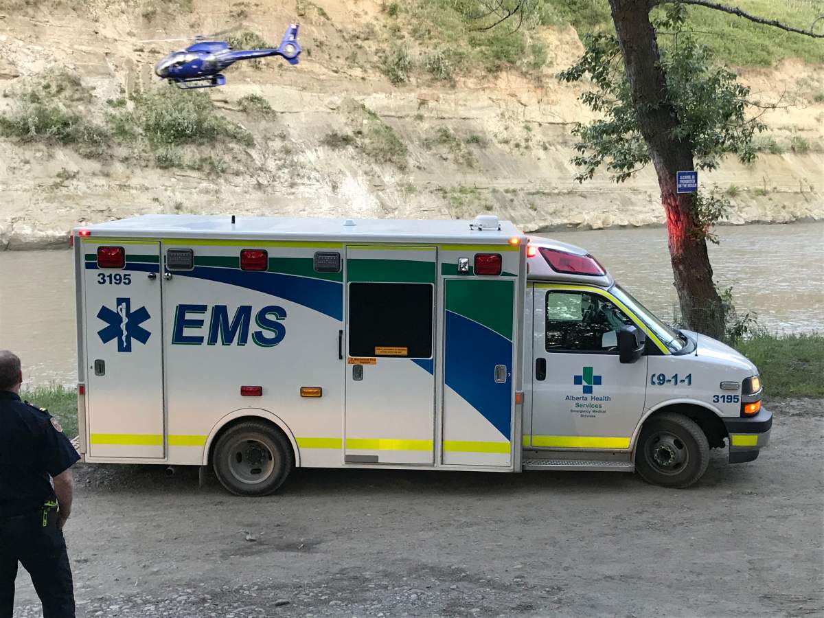 Emergency crews respond to reports of a missing man in the Highwood River southeast of Calgary, June 30, 2019.