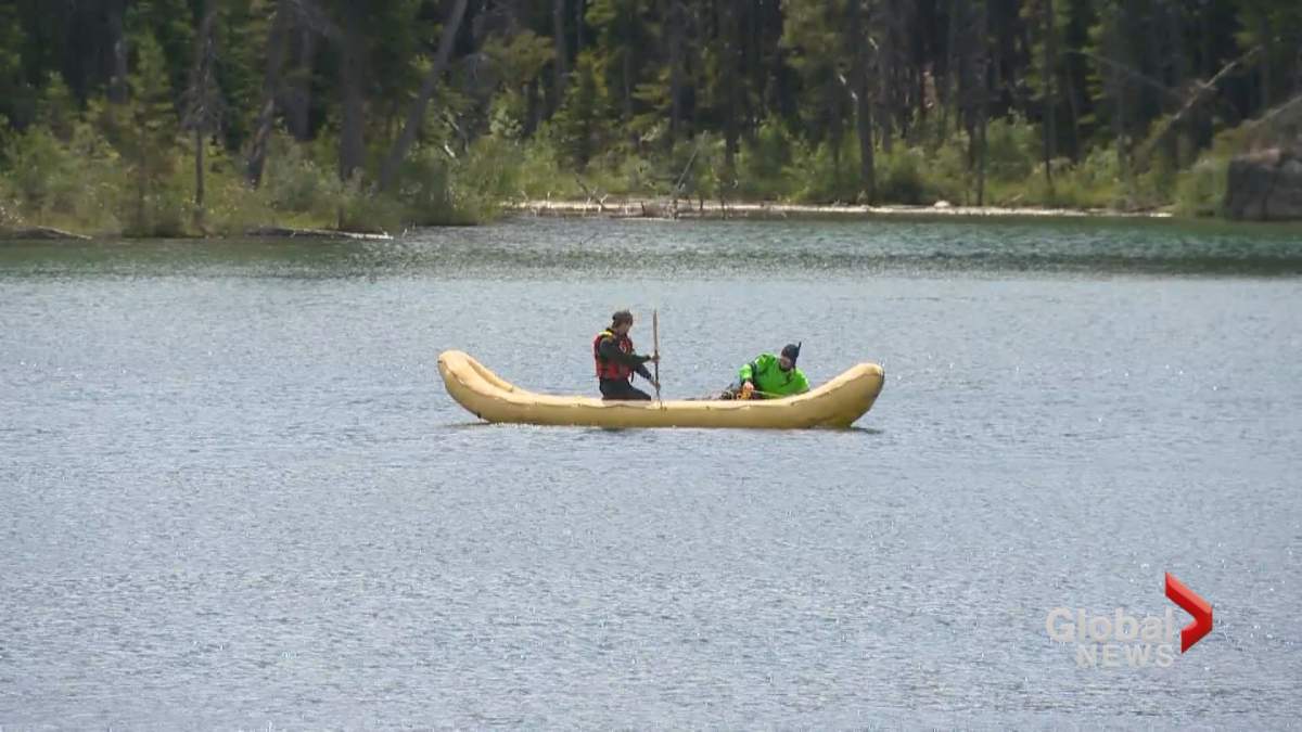 Search crews look for the body of a man presumed drowned at Herbert Lake in Alberta.