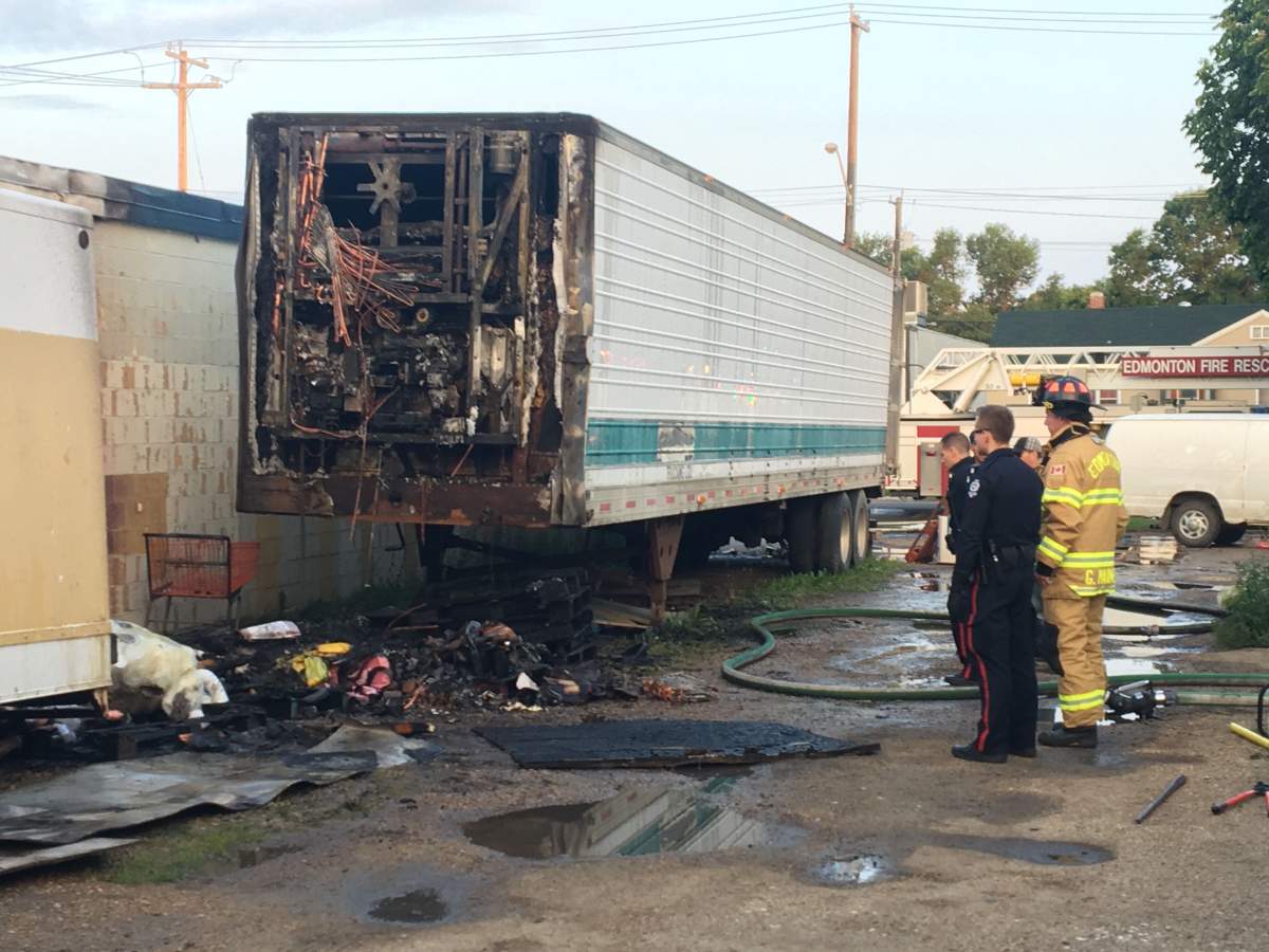 Edmonton firefighters putting out a fire at Fatima’s Discount Food Store (11816 66 St.) on Monday, July 15, 2019.