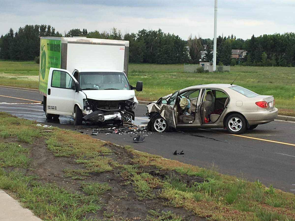 A car and a van collided on the 66 Street bridge over Anthony Henday Drive in southeast Edmonton on Wednesday, July 24, 2019.