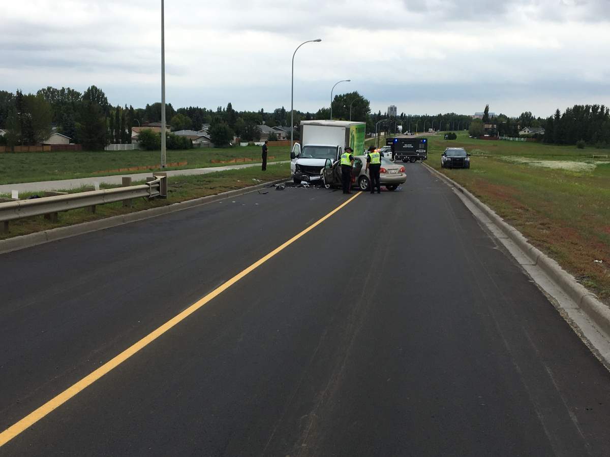 A car and a van collided on the 66 Street bridge over Anthony Henday Drive in southeast Edmonton on Wednesday, July 24, 2019.