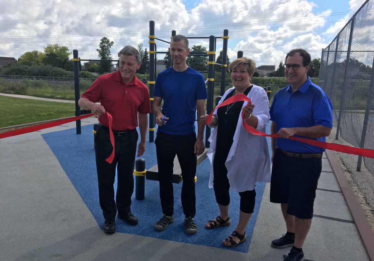 Officals cut the ribbon of the new fitness park at the Whyte Ridge Community Centre.