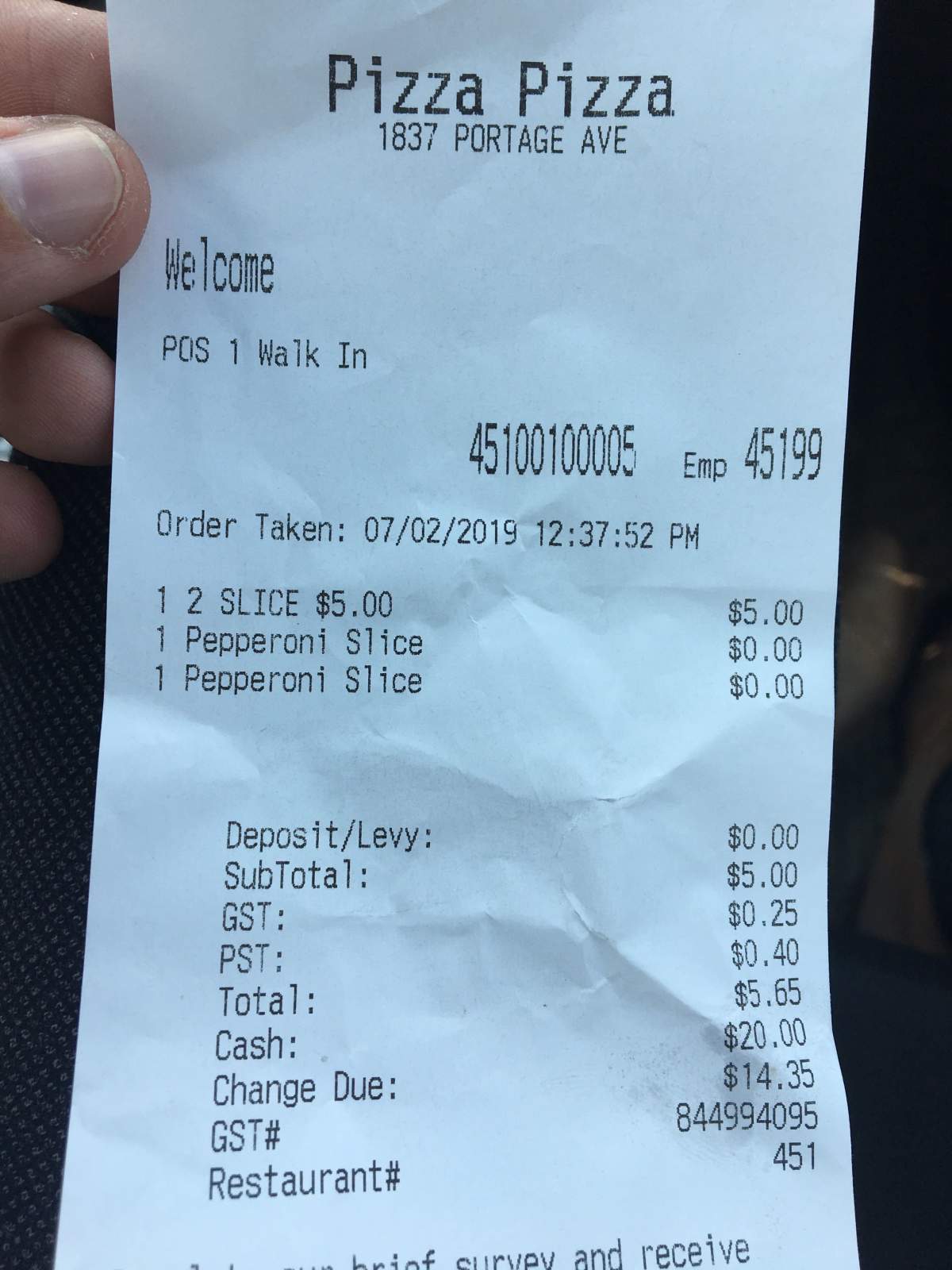 A Pizza Pizza receipt showing an 8 per cent PST charge instead of 7.