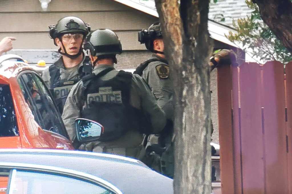 Edmonton police respond to an incident outside the Capilano Walmart Saturday night.