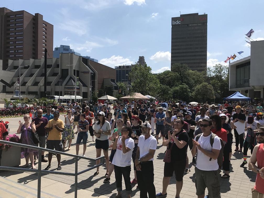Hundreds of people showed up for a rally in front of Hamilton city hall on Saturday in support of the city's LGBTQ2 community.