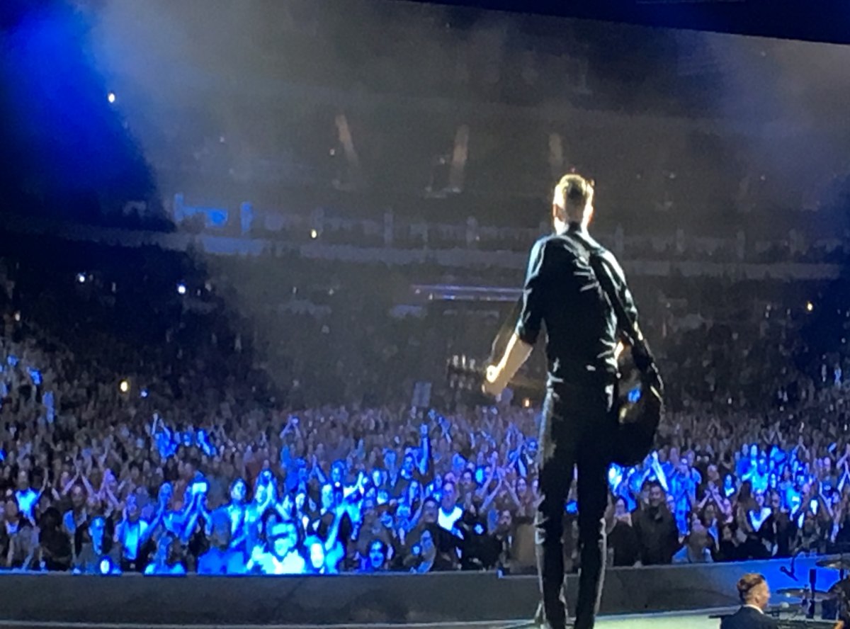 Bryan Adams strums on his guitar in front of 9,000 fans at Bell MTS Place in Winnipeg on July, 8th 2019.