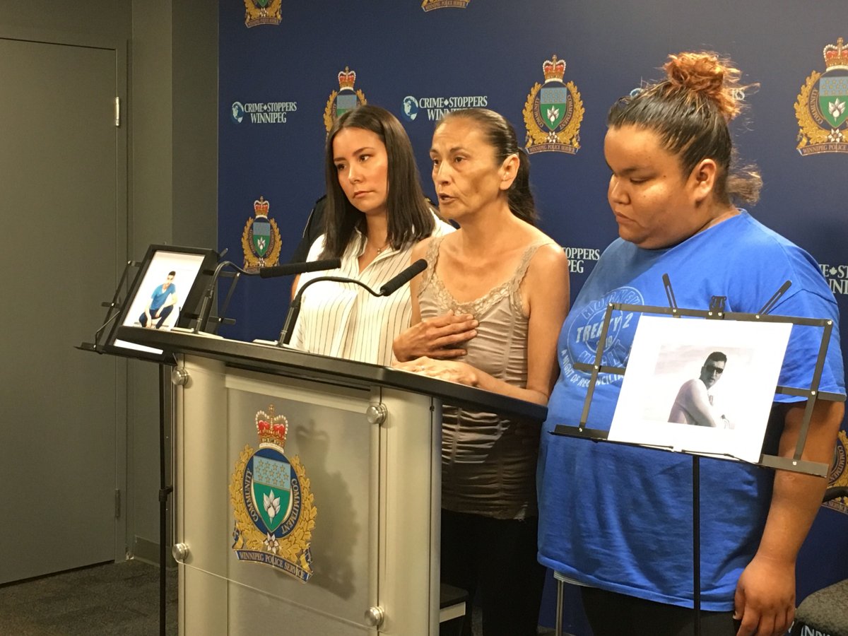 Sara Coates, centre, pleads for information relating to her brother's disappearance. Sara's daughters Dawna and Marina stand with their mother.