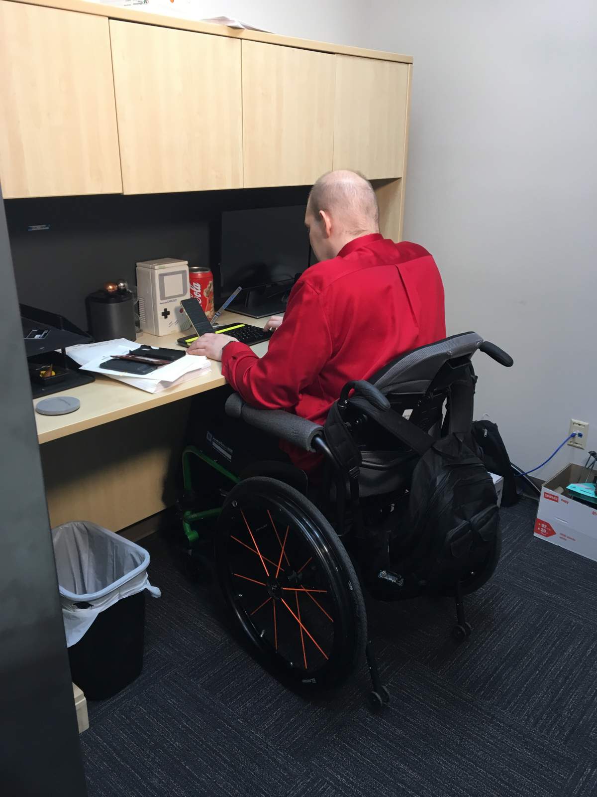 Wade Brown listening to legal notes at Masuch Law.