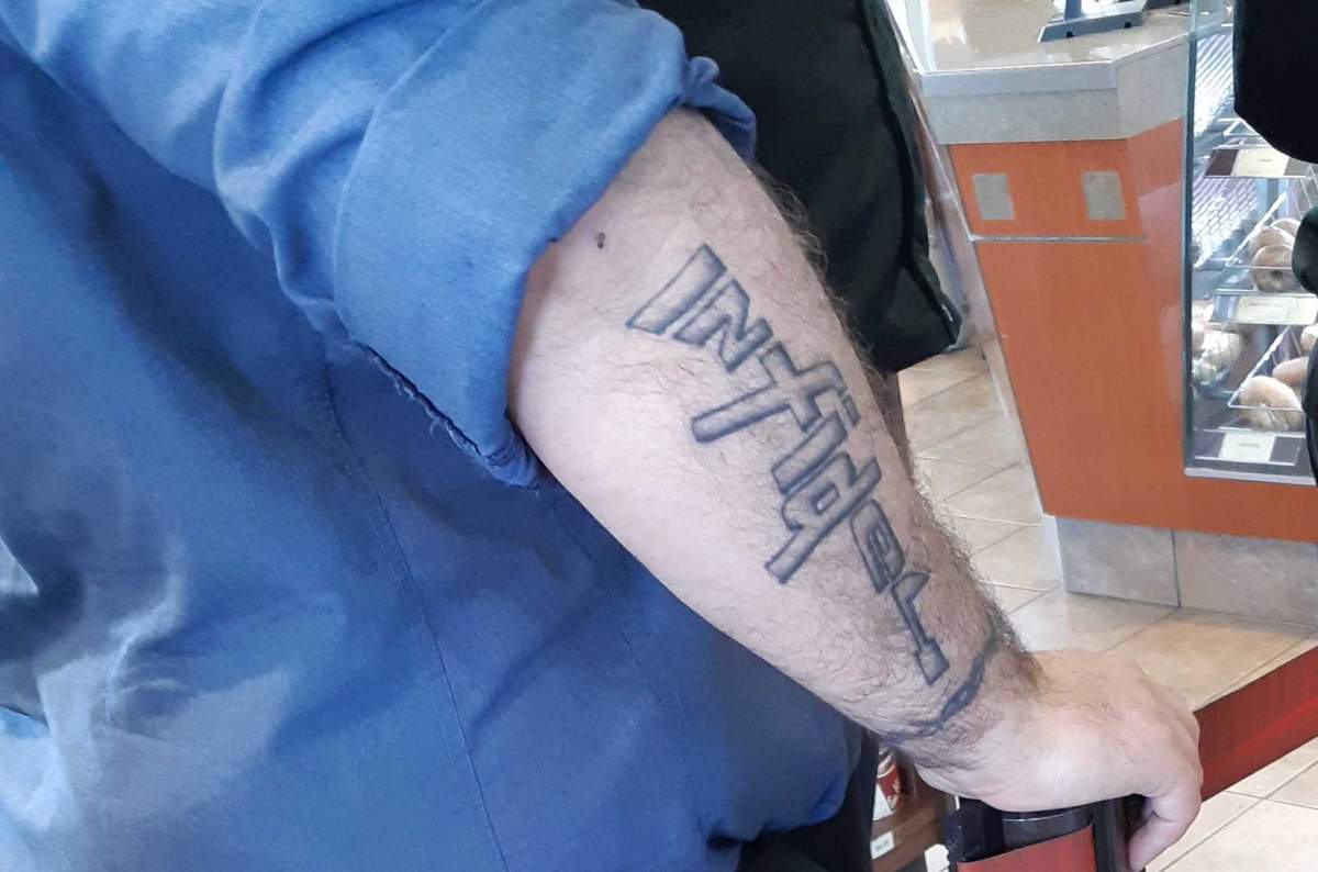 The Canadian Armed Forces have confirmed that a sailor who had a tattoo of the word "infidel" in the shape of a rifle has acknowledged concerns raised on social media. 