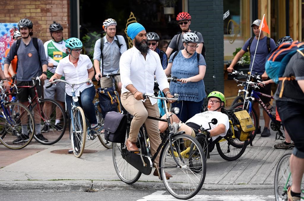 NDP Leader Jagmeet Singh participates in a group bike ride with Ottawa Centre residents after announcing his party's vision for a national cycling strategy in Ottawa on Thursday, July 11, 2019.